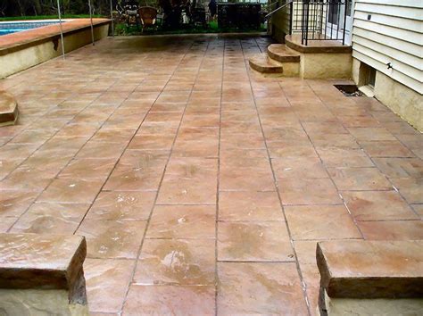 Stamped And Stained Concrete Patio That Looks Like Terracotta Tile