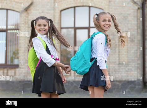 Happy Two School Girls Best Friends Together Outdoor Stock Photo Alamy