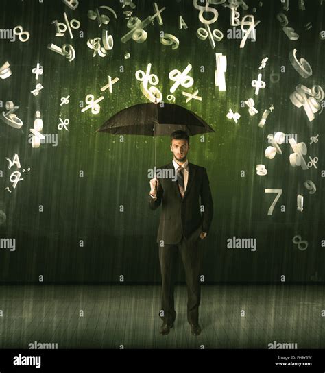 Businessman Standing With Umbrella And 3d Numbers Raining Concept Stock