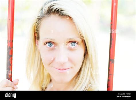 Portrait Of A Young Blond Woman With Big Blue Eyes Stock Photo Alamy