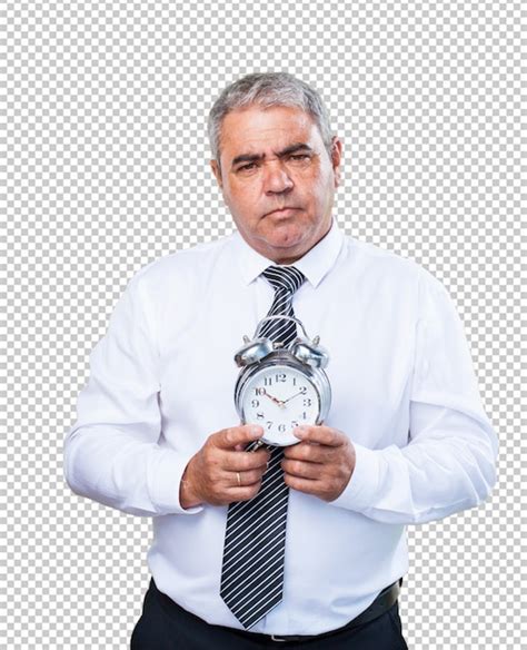 Premium PSD Mature Man Holding An Alarm Clock