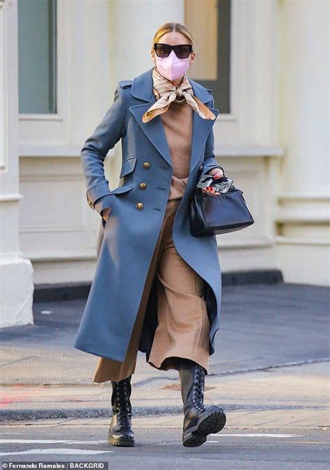 Olivia Palermo Pairs Camel Sweater And Culottes With Blue Coat In NYC