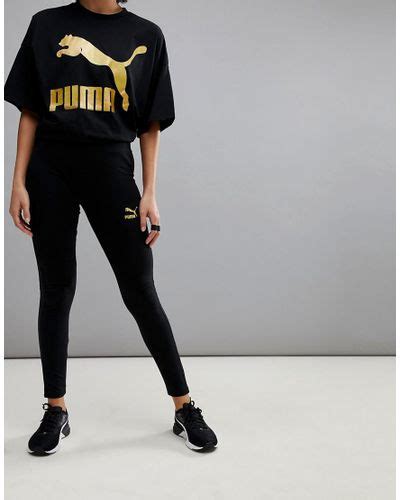 PUMA Leggings With Gold Logo In Black Lyst