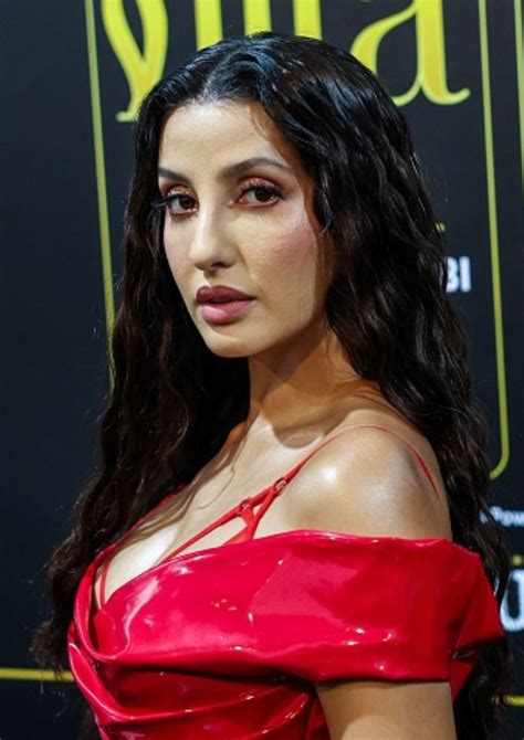 Nora Fatehi Raises Temperature In A Red Dress At IIFA Rocks 2023