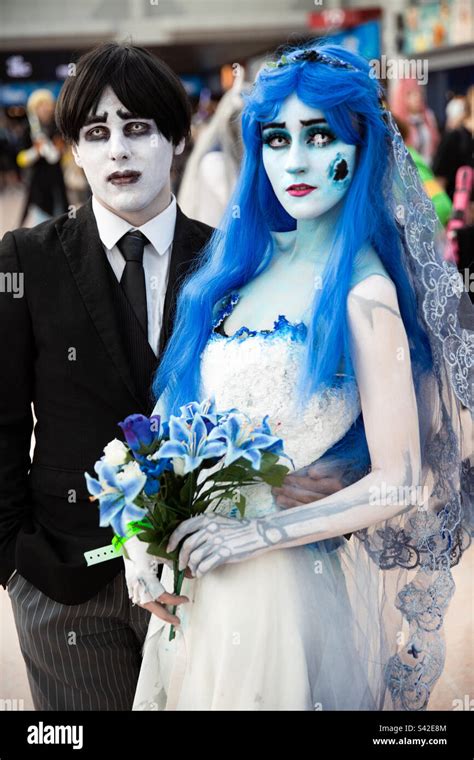 A Cosplay Girl And Boy Dressed As Tim Burtons Corpse Bride And Groom At