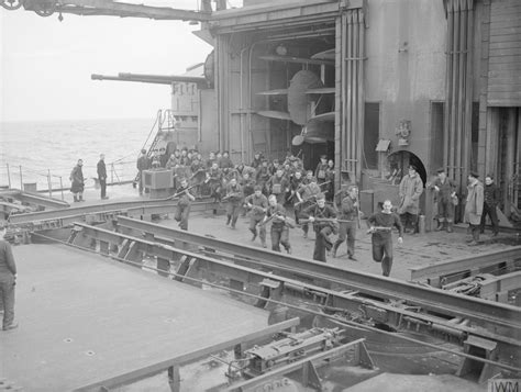 Sailors on battleship HMS King George V training to form a landing ...