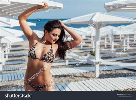 Beautiful Brunette Woman Swimsuit Sunbathes On Stock Photo Shutterstock