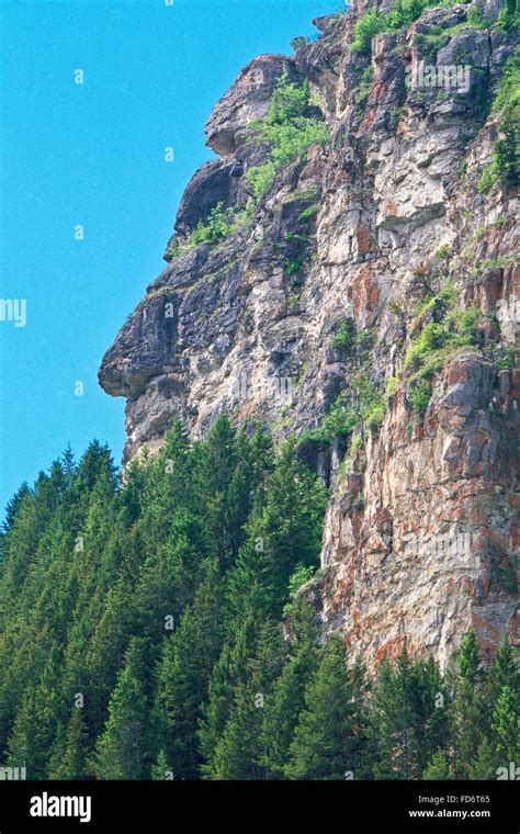 Indian Head Rock On A Cliff Face Along The Rocky Mountain Front Near