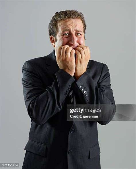 Man Biting Fingernails Photos And Premium High Res Pictures Getty Images