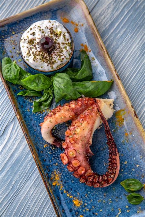 Grilled Octopus With Sauce And Basil Natural Delicious Food Greek