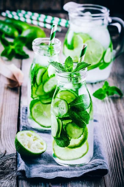 Premium Photo Detox Water With Cucumber Lime And Mint In Bottles