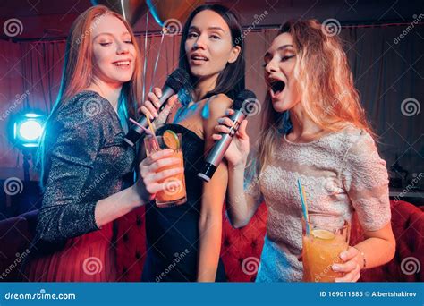 Emotional Cheerful Women in Karaoke Bar Stock Image - Image of enjoyment, brunette: 169011885