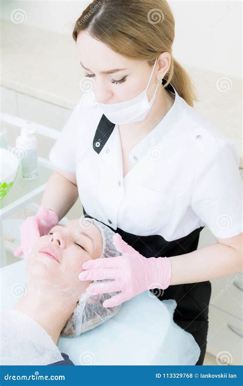 A Close Up Of The Cleaning Procedure In The Office Of Cosmetology