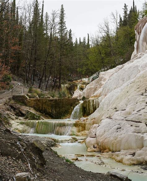 Hot Springs At Bagni San Filippo With Calcium Carbonate Deposits Surrounding The Thermal Water