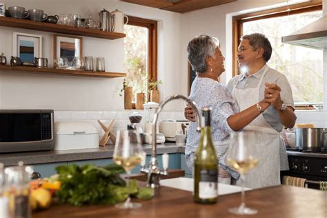 Dance Love And Mature Couple In Kitchen For Bonding Loving