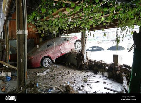 A Car Is Damaged By Multiple Mudslides Triggered By Heavy Rainfall In