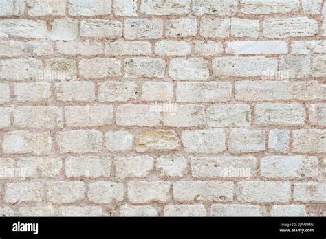 Photo of old brick wall. Beige background, texture of big brick wall Stock Photo - Alamy