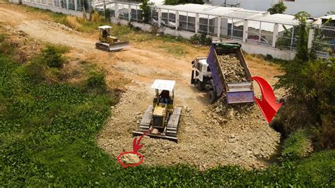 Incredible Bulldozer Clearing Road Dump Truck Pouring Rock In