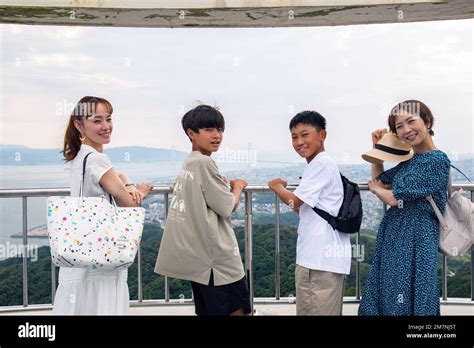 Four Japanese People On A Outing Two Mature Women And Two Year Old