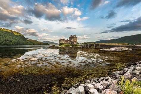 The Eilean Donan Castle at Sunrise Stock Photo - Image of perspective ...