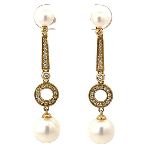 Drop Shaped Pearl And Multi Gemstone Dangle Earring With Diamonds In