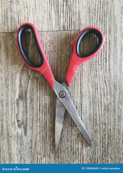 Red Scissors Closed On A Wooden Table Stock Image Image Of House