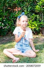 Little Girl Eating Chocolate Ice Cream Stock Photo 2058072059 | Shutterstock