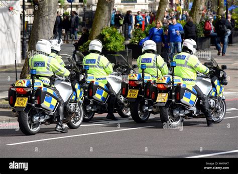 Metropolitan Police Motorcycle Riders In Piccadilly London Uk Stock