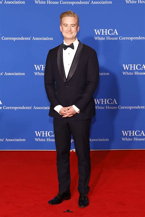 Bird landing on Fox News' Peter Doocy's head while he's live from White