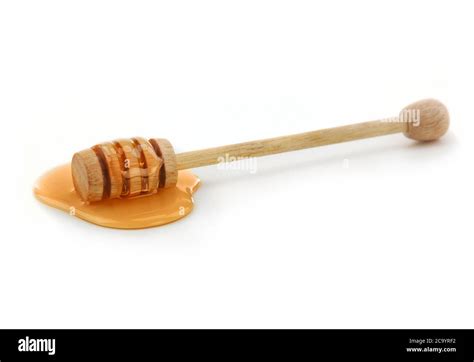 Honey dipper isolated Stock Photo - Alamy