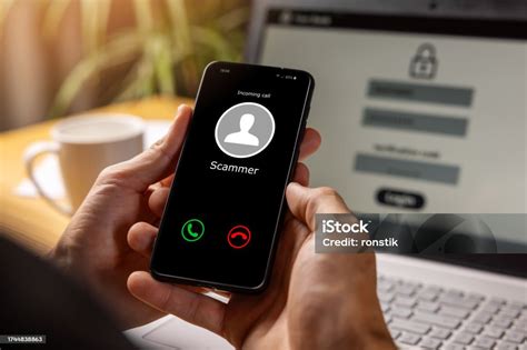 Phishing Hands Holding Phone With Incoming Call From Scammer Stock