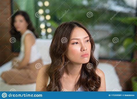 Two Asian Woman Not Talking Each Other When They In Bed Room Stock Image Image Of Asian