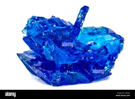 Blue crystals of vitriol, Copper sulfate, isolated on white background ...