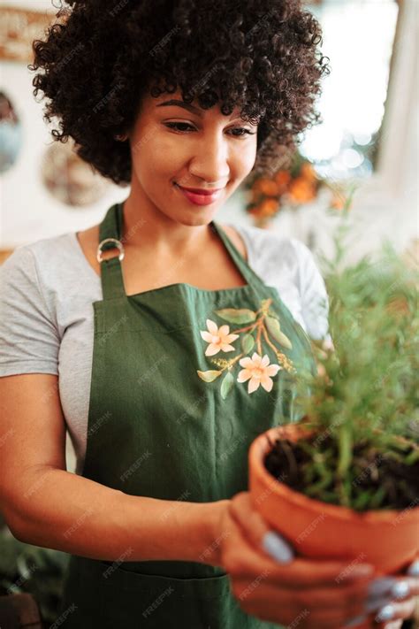 Free Photo Close Up Of A Womans Hand Holding Potted Plant