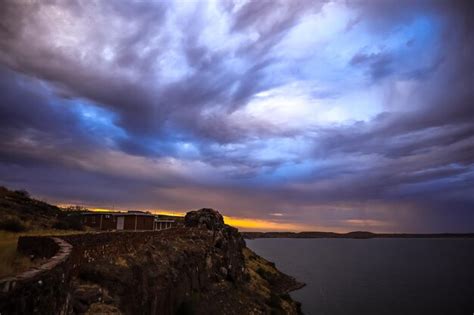 Premium Photo | Roiling clouds over wated