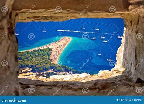 Zlatni Rat Beach Aerial View through Stone Window Stock Image - Image ...