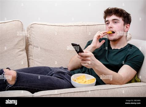 Eating Crisps Tv Hi Res Stock Photography And Images Alamy