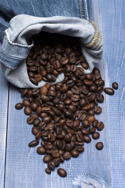 Coffee Beans With Blue Jeans Stock Image Image Of View Sweet 79002897
