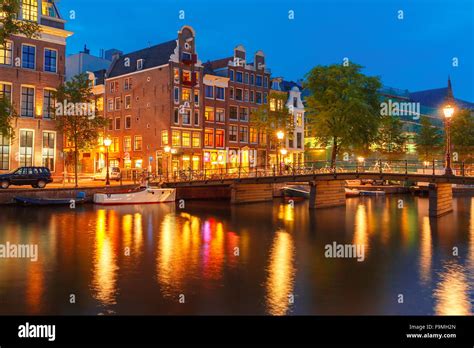 Night City View Of Amsterdam Canal And Bridge Stock Photo Alamy