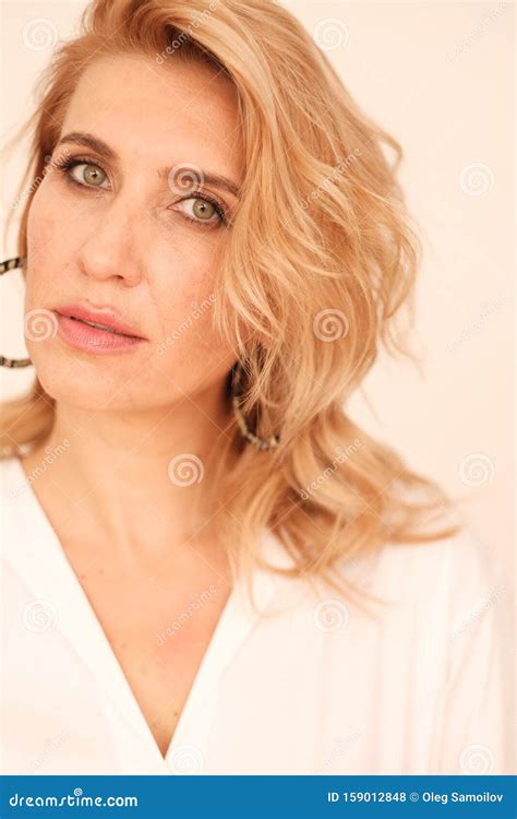 Close Up Portrait Of A Beautiful Adult Woman 35 45 Years Old With Blond