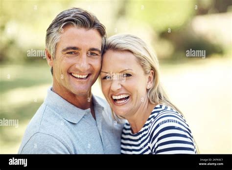 Sunshine And Smiles Cropped Portrait Of An Affectionate Mature Couple