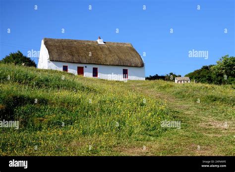Irish Cottage With Thatched Roof On Irishmore Aran Island Ireland