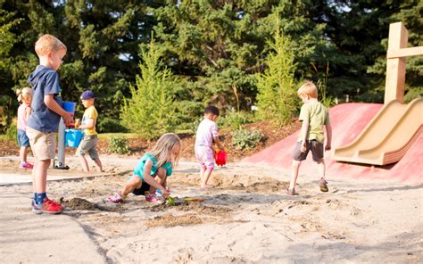 sand-play-slide-children-playground-natural-calgary - Earthscape Play