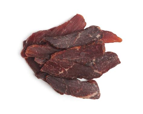 Pieces Of Delicious Beef Jerky On White Background Top View Stock