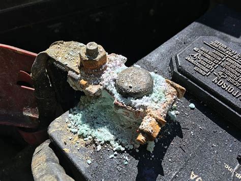 How to Clean Corroded Battery Terminals - AxleAddict