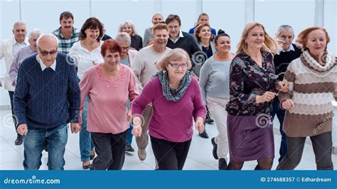 A Group Of Pensioners Are Preparing To Run Forward Stock Image Image