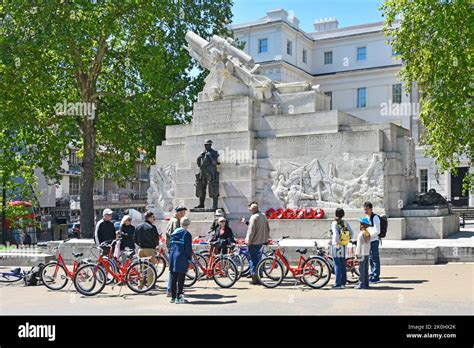 Tour Guide On Conducted Guided Tour Group Of Men And Women Tourists Hired