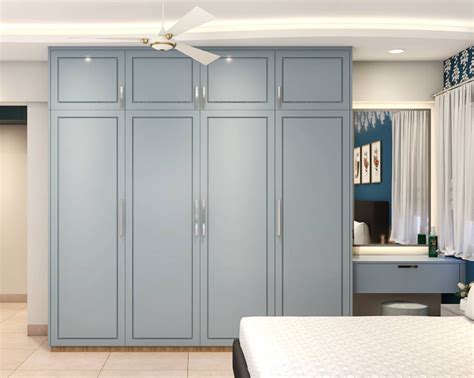 Spacious Wardrobe Design With Loft Storage Livspace