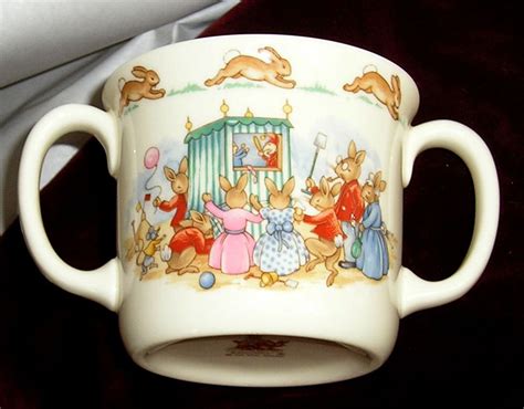 Royal Doulton Bunnykins Two Handled Hug A Mug Ivory Multi Colored Punch Judy Mugs Punch And