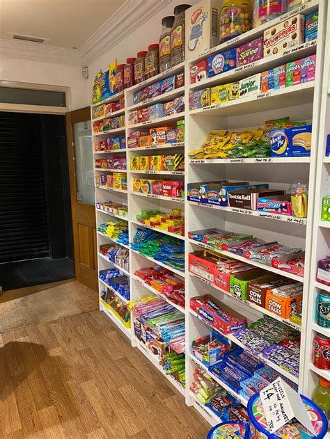 A Store Filled With Lots Of Different Types Of Food On Shelves Next To